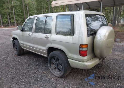 1999 Isuzu Trooper из США, поврежденный, VIN 1ACDH58VXR7908045